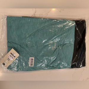 NEW 2 pack pocket T-shirts. 1101